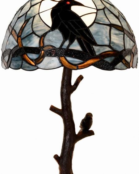 Raven Sitting on Bare Tree Branch in Full Moon Night